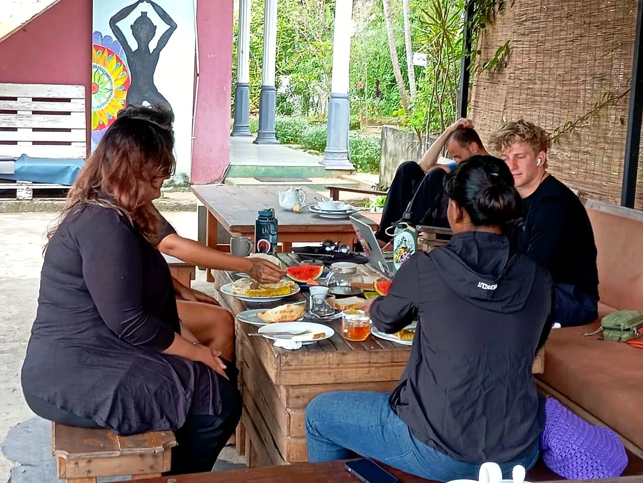 Guests sharing a meal at the hostel